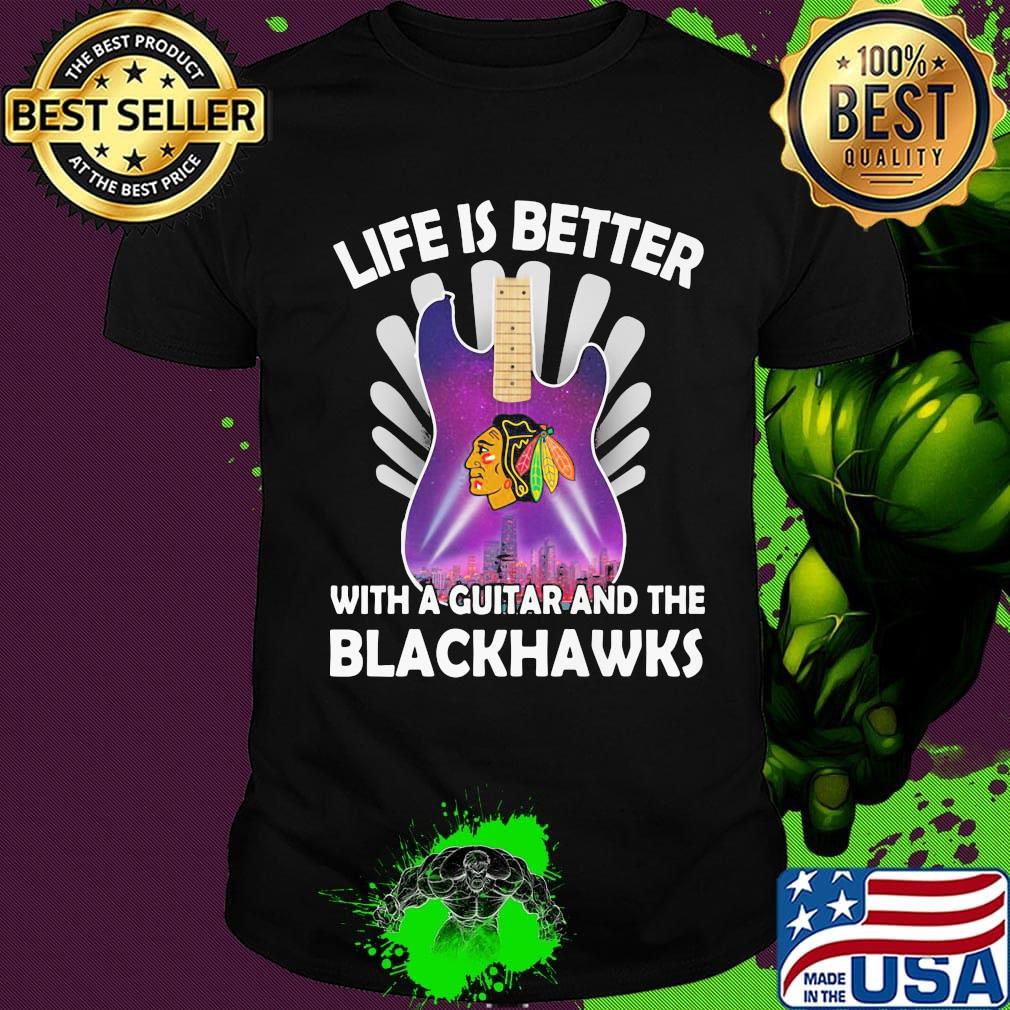 Life is better with a guitar and the blackhawks shirt