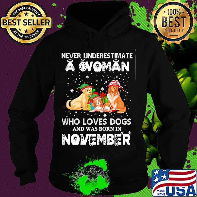 Never underestimate a woman who loves dogs and was born in november christmas s Hoodie Never underestimate a woman who loves dogs and was born in november christmas s Hoodie