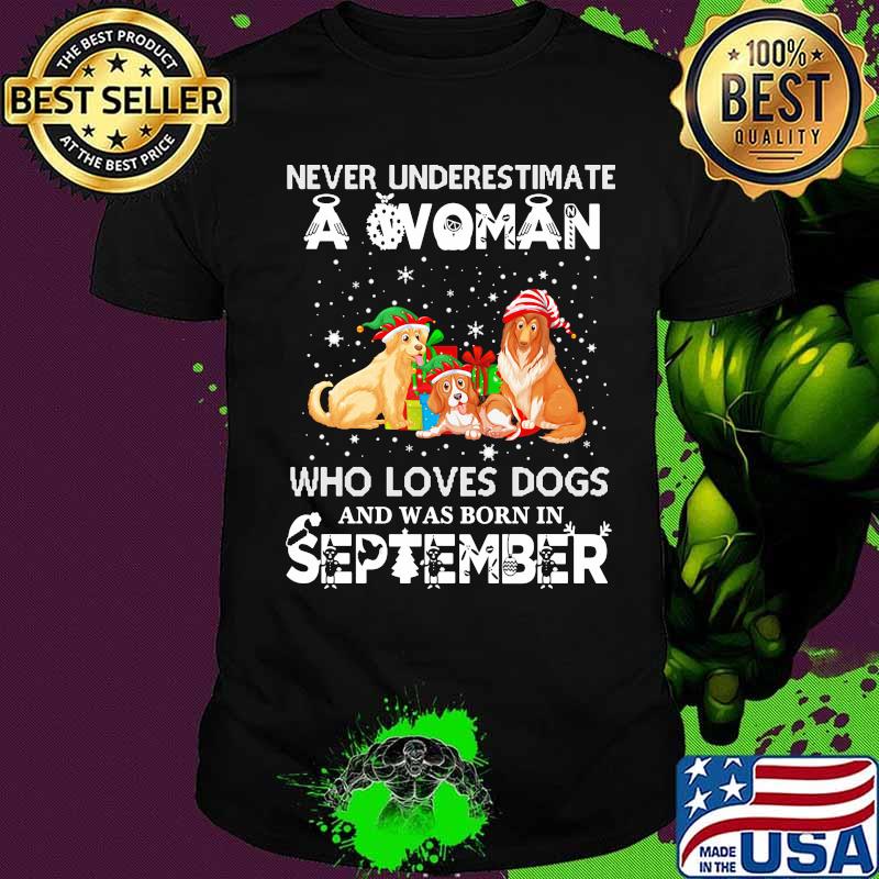 Never underestimate a woman who loves dogs and was born in september christmas shirt