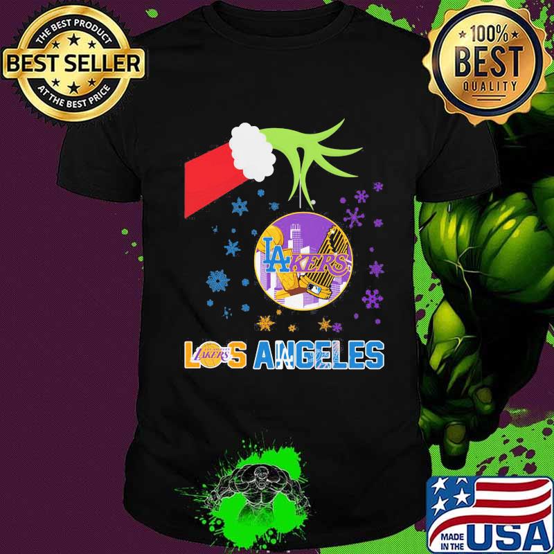 Merry christmas grinch holding los angeles lakers shirt