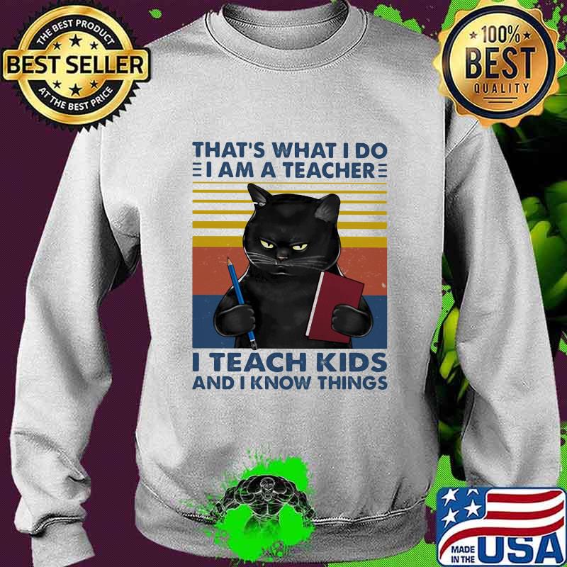 That’s What I Do I Am A Teacher I Teach Kids And I Know Things Black Cat Vintage Shirt Sweater That’s What I Do I Am A Teacher I Teach Kids And I Know Things Black Cat Vintage Shirt Sweater
