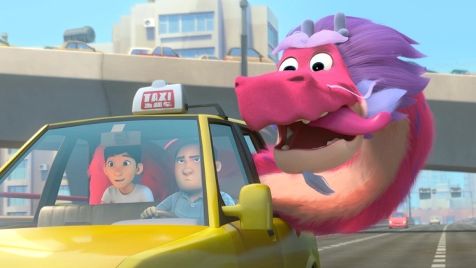 The hero of “Wish Dragon” doesn’t have big ambitions. Shanghai-based Din (Jimmy Wong) may be dirt poor and desperate, but he’s unusually well-grounded as such characters go. When offered three wishes, he honestly doesn’t know what to request — whereas Long, his dutiful, all-powerful dragon (voiced by John Cho), is full of suggestions: Why not wish for piles of gold? Or his own personal army? After all, every one of Long’s previous masters wanted wealth and power. But not Din. He just wants his best friend back.  In the film’s upbeat opening, we see young Din and neighbor Li Na bonding over all things dragons. They pinky-swear to being pals forever, then the prologue turns melancholy, as Li Na’s father moves away and the buddies are separated. Flash forward a few years, and Din still can’t get her out of his mind — and who can blame him, now that Li Na’s a successful model whose face pops up on billboards all over town (including one of the roof of the hovel where Din still lives with his pragmatic Mom, voiced by Constance Wu).  So when poof, the magic dragon shows up eager to serve, Din doesn’t covet money or power per se — although both would help him finagle his way into Li Na’s birthday party, since she’s now wealthy enough to be out of his league. To Long’s surprise, Din wishes for temporary wealth and power (but just enough dough to get through the door), trusting that they’ll be able to pick up where they left off if they can only be reunited.  The plot’s a little “have your cake and eat it too” in this regard: “Wish Dragon” presents Din as a pure, sincere soul — someone who can teach Long a lesson or two about life’s priorities — but also as a “peasant” to Li Na’s “princess.” Ergo, we’d expect him to be a little greedier in compensating for all that he lacks. But that’s not so hard to accept, since Appelhans’ aesthetic — both the quick, clever animation style (a zippy pose-to-pose technique that mirrors classic martial-arts movies) and all-around openness to Chinese culture, old and new — proves so entertaining unto itself. The exaggerated squash-and-stretch style (reminiscent of “Despicable Me” and the “Madagascar” movies) elevates otherwise familiar scenes, as when Din (who idly wishes he knew how to fight) faces off against a trio of lithe henchmen. And it’s great fun to watch Long bend and fold at right angles. (Chinese audiences benefit from producer Jackie Chan supplying his voice for the Mandarin-language version.)