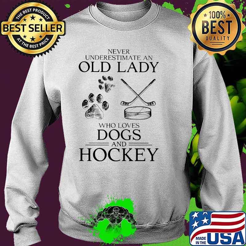 Never Underestimate An Old Lady Who Loves Dogs And Hockey Shirt Sweater Never Underestimate An Old Lady Who Loves Dogs And Hockey Shirt Sweater