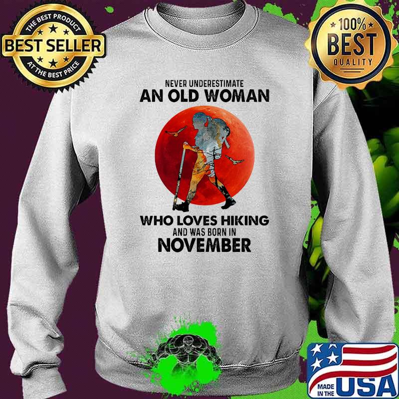Never underestimate an old woman who loves hiking and was born in november blood moon s Sweater Never underestimate an old woman who loves hiking and was born in november blood moon s Sweater