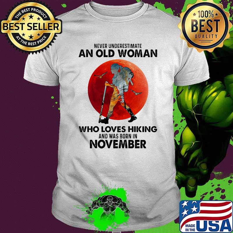 Never underestimate an old woman who loves hiking and was born in november blood moon shirt