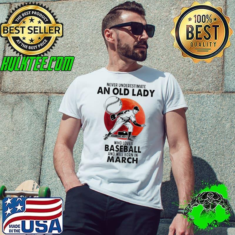 Never underestimate an old lady who loves baseball and was born in March blood moon s Unisex Never underestimate an old lady who loves baseball and was born in March blood moon s Unisex