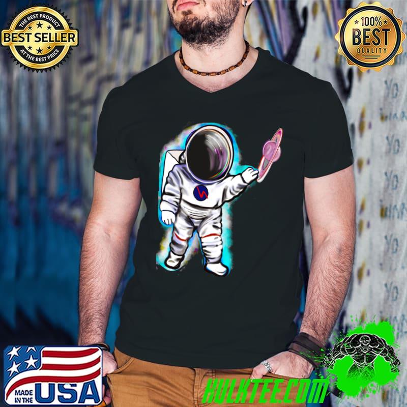 Astronaut in Space suit reaching out to touch Saturn’s ring T-shirt