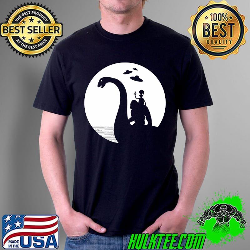 Sasquatch Bigfoot Riding Loch Ness Monster T-Shirt Unisex Sasquatch Bigfoot Riding Loch Ness Monster T-Shirt Unisex