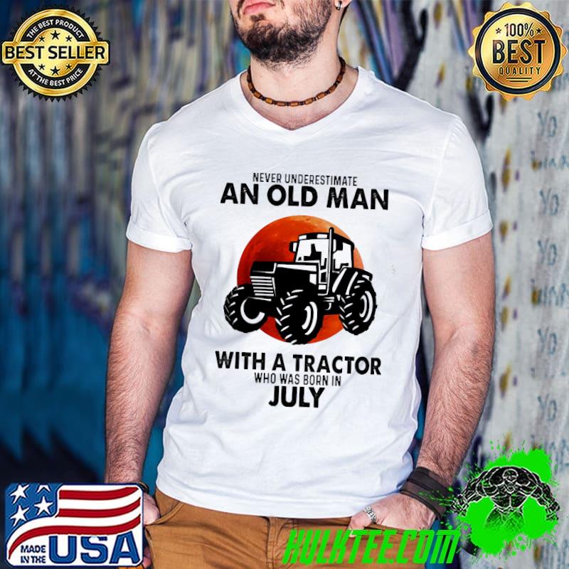 An old man with a tractor who was born in July shirt
