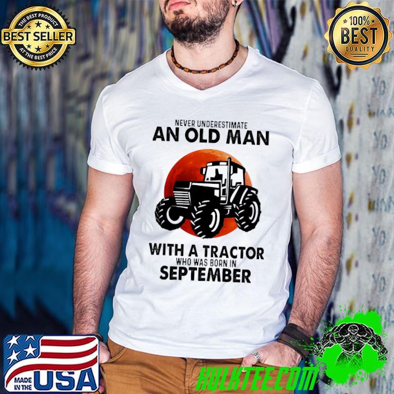 An old man with a tractor who was born in September shirt