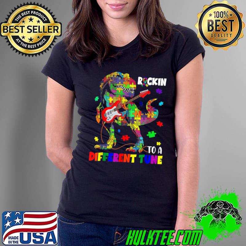 Rockin' To A Different Tune Autism Awareness T Rex Dinosaur T-Shirt Ladies Tee Rockin' To A Different Tune Autism Awareness T Rex Dinosaur T-Shirt Ladies Tee