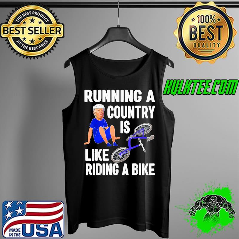 Biden falls off bike Joe Biden falling off his bicycle Running a country s Tank Top Biden falls off bike Joe Biden falling off his bicycle Running a country s Tank Top