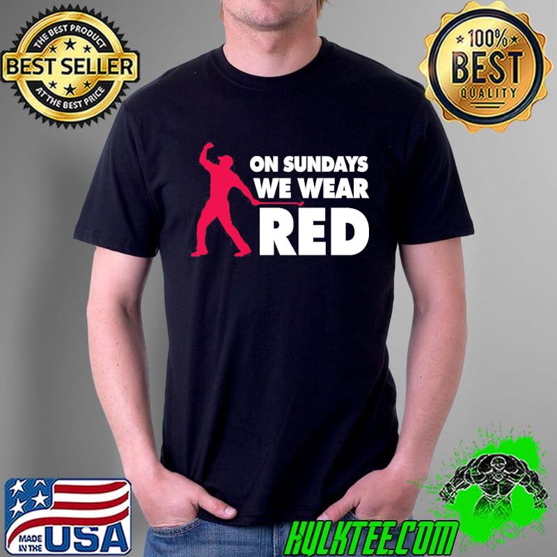 On sundays we wear red black shirt