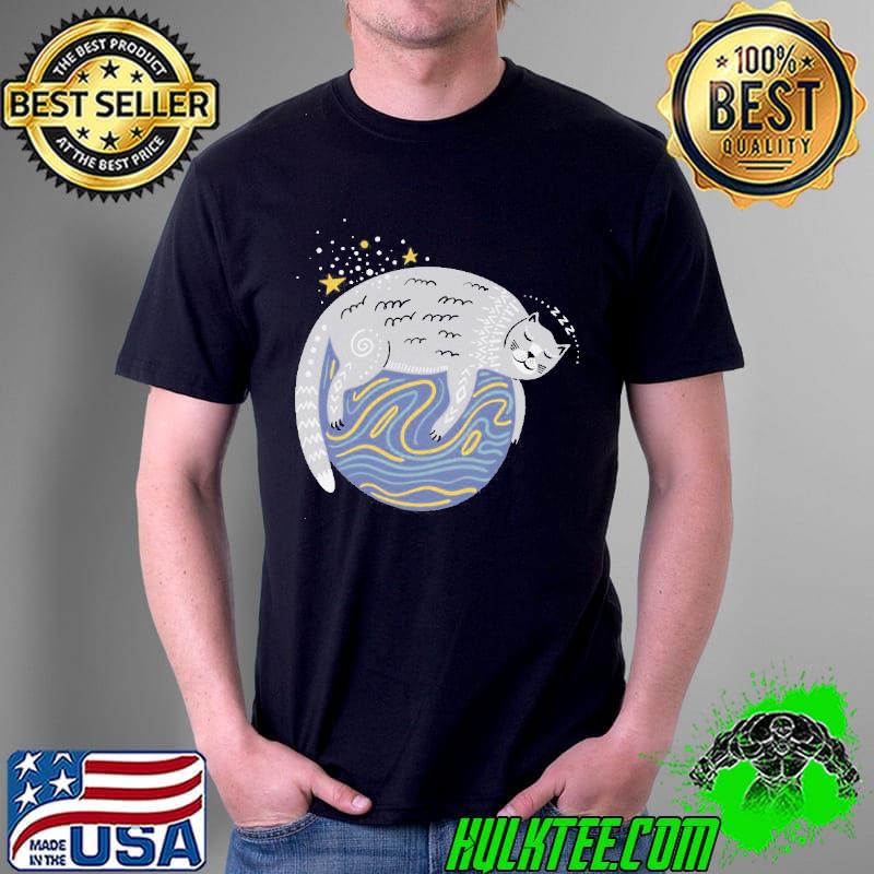 Whimsical cat sleeping on a planet shirt