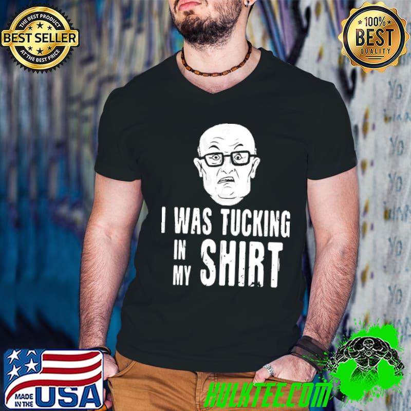 Tucking in his rudy giulianI classic shirt