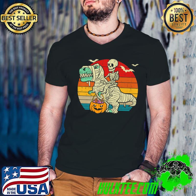 Skeleton riding mummy dinosaur t rex halloween pumpkin vintage sunset T-Shirt