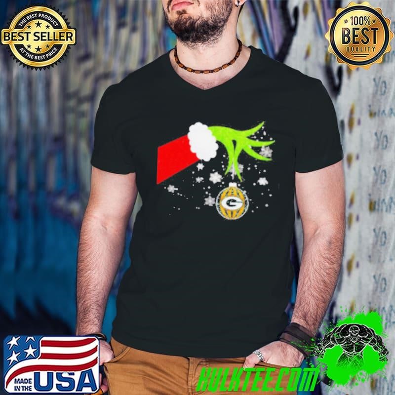 Grinch hand holding ornament Packers football Christmas shirt